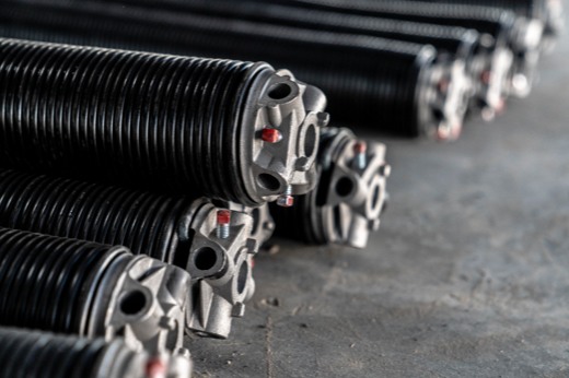 Damaged Garage Door That Needs Either Repaired or Replaced