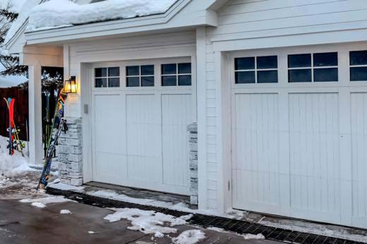 A Garage Door in a Snowy Scene
