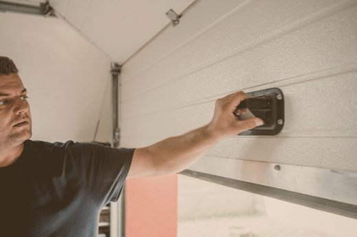 Inspecting Garage Door